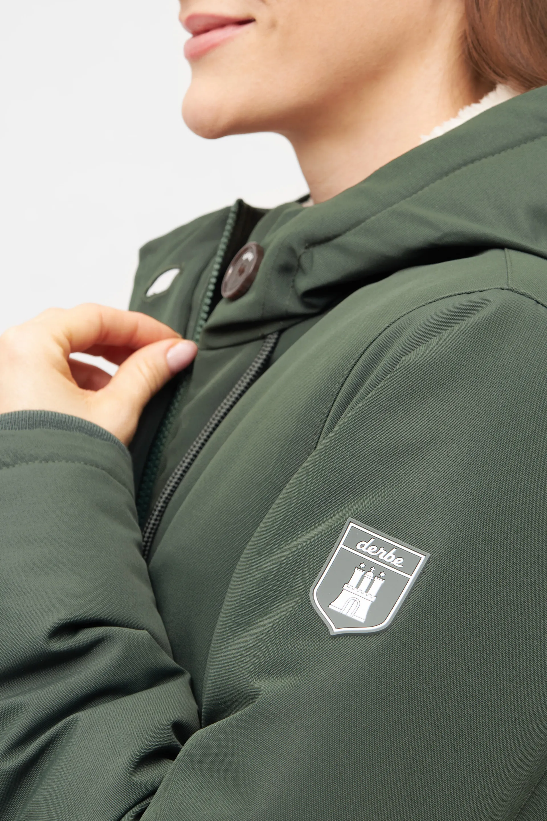 Derbe Winterjacke Festholm Damen Dunkelgrün